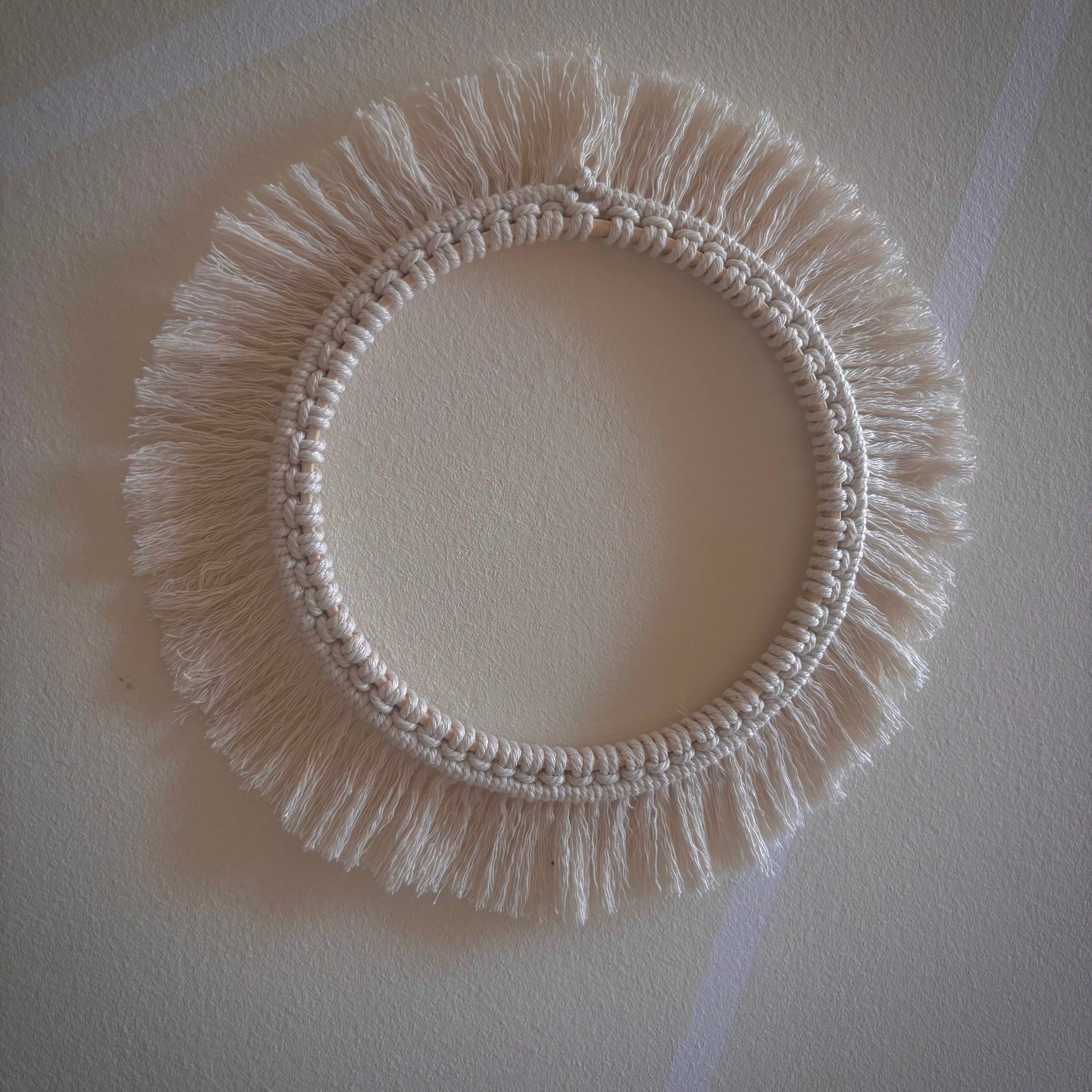 Cornice in macramè