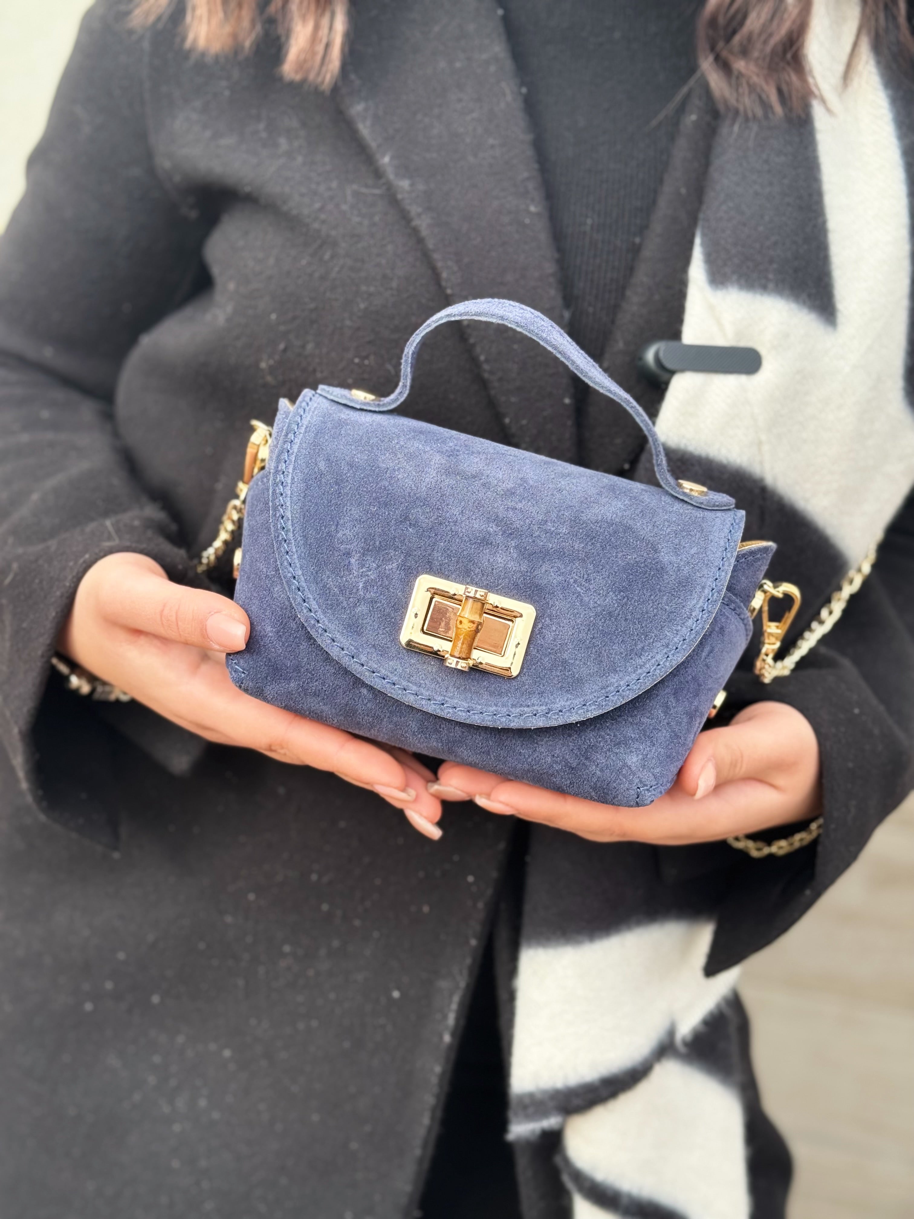 Borsa in vera pelle scamosciata con chiusura in bambù