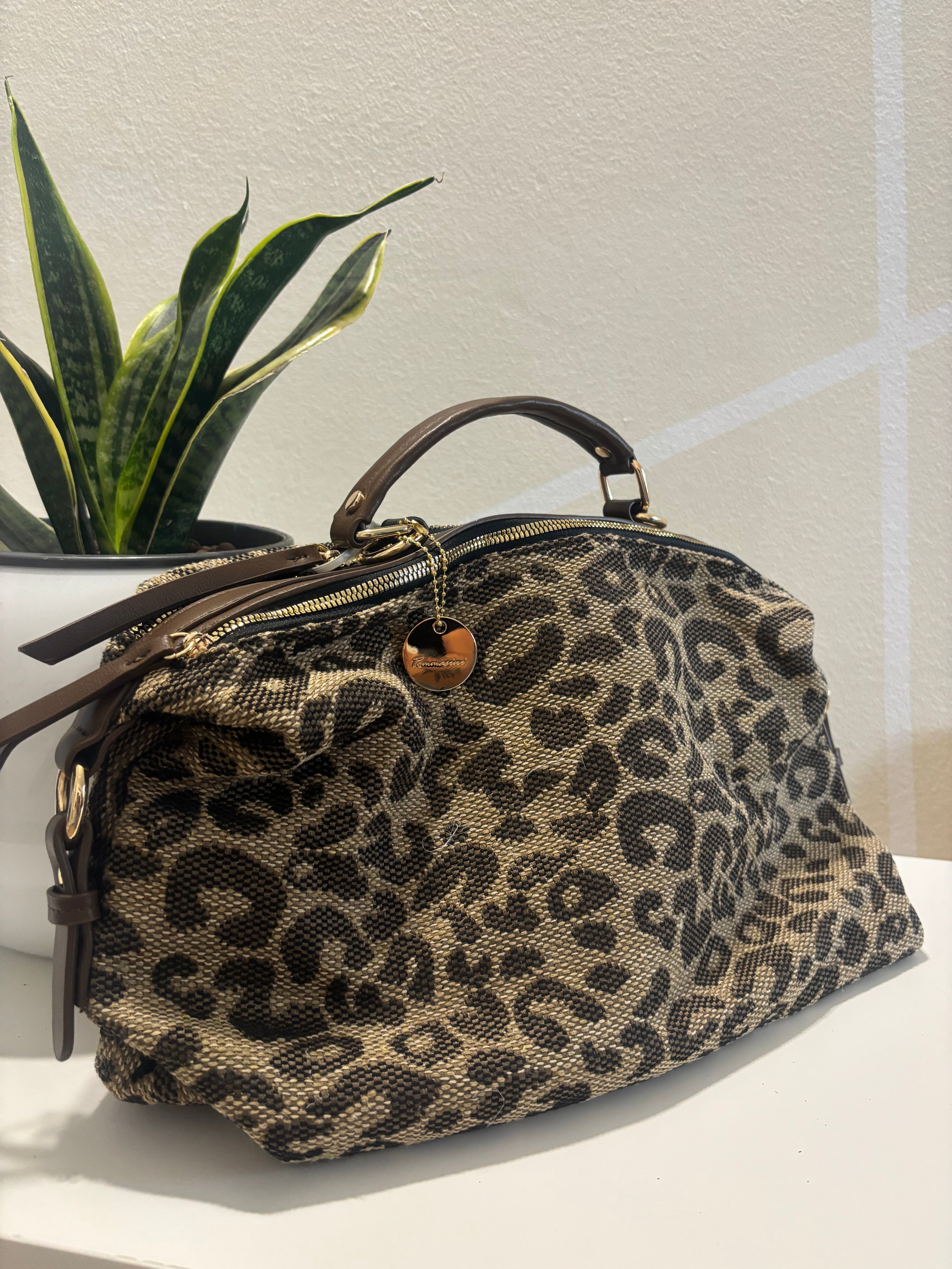 Leopardata doppia cerniera