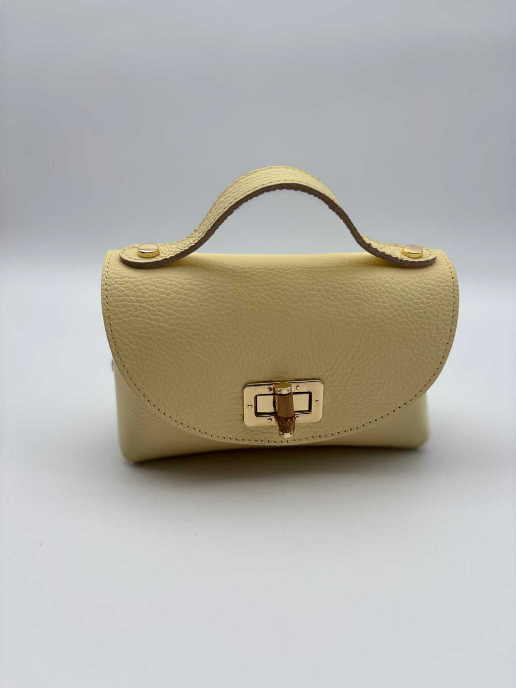 Borsa in vera pelle con chiusura in bambù giallo